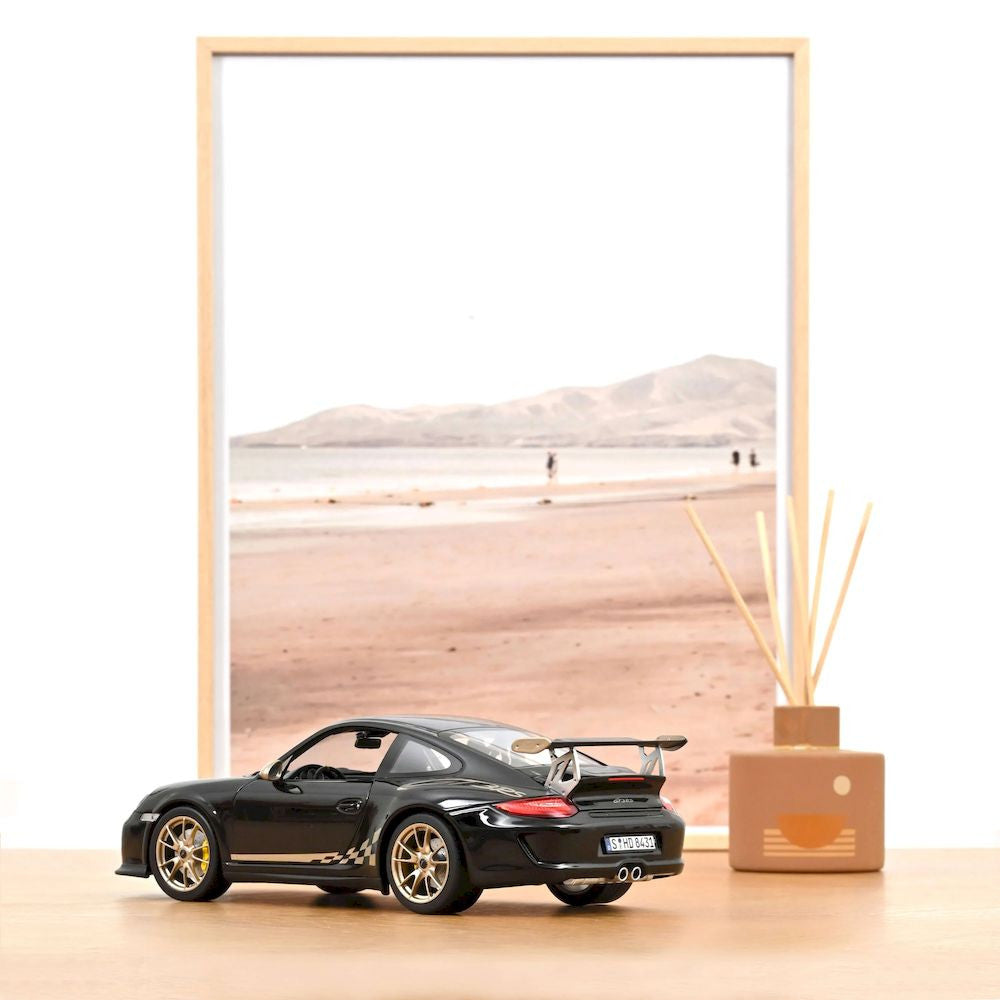 Macheta auto Porsche 911 GT3 RS, Black and White Gold Metallic, 2009 1:18 Norev