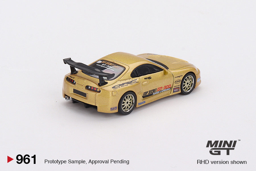 Macheta auto Toyota Supra MK4 (A80) Top Secret GT-300 Top Secret Gold 2023 (RHD) 1:64 MIniGT