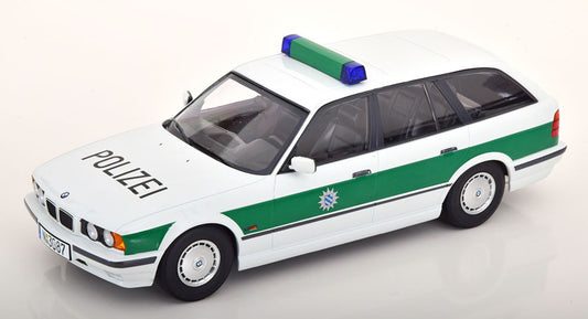 Macheta auto BMW 5 Series E34 Polizei 1996 1:18 Triple 9