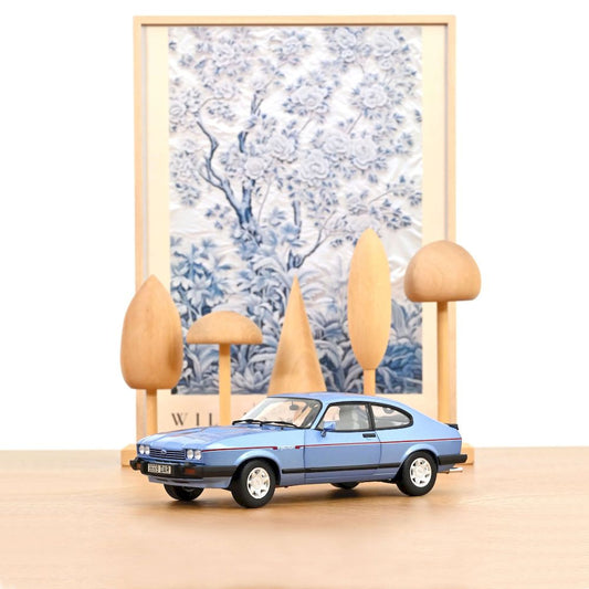 Macheta auto Ford Capri Mk.III 2.8 Injection, Paris Blue metallic, 1984 (RHD) 1:18 Norev