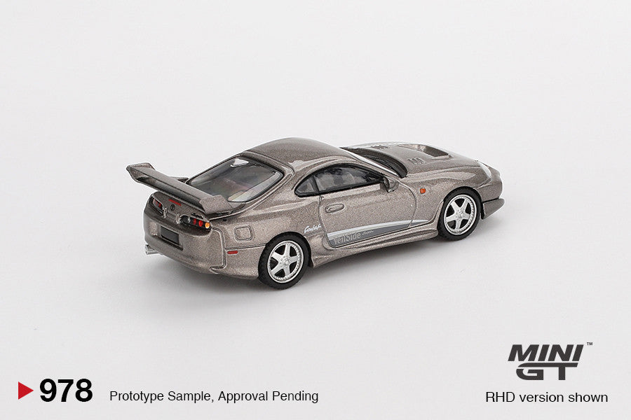 Macheta auto Toyota Supra MK4 (A80) VeilSide Combat V-II Combat Grey 2011 (LHD) 1:64 MIniGT