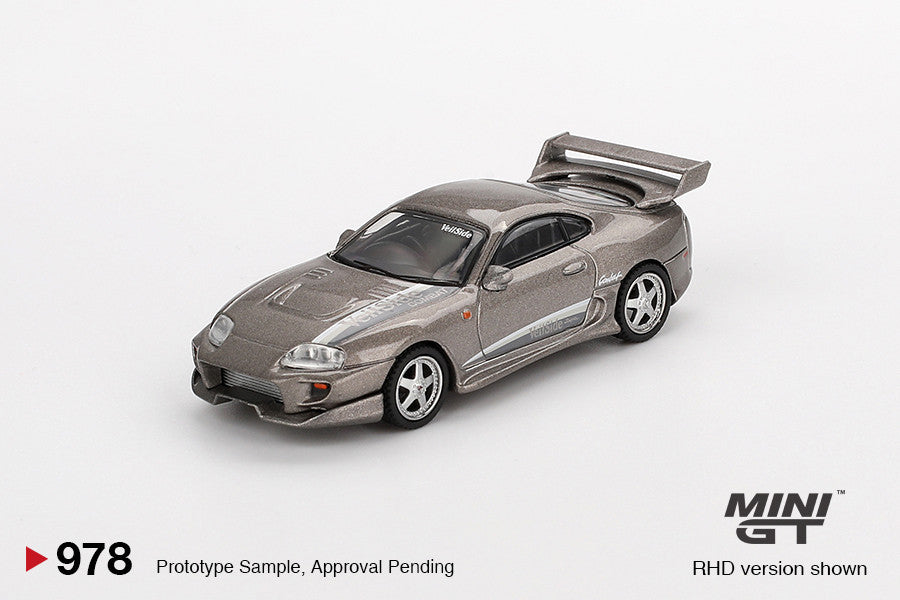 Macheta auto Toyota Supra MK4 (A80) VeilSide Combat V-II Combat Grey 2011 (LHD) 1:64 MIniGT