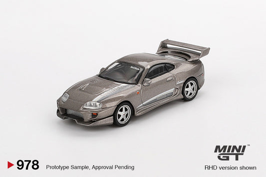 Macheta auto Toyota Supra MK4 (A80) VeilSide Combat V-II Combat Grey 2011 (LHD) 1:64 MIniGT
