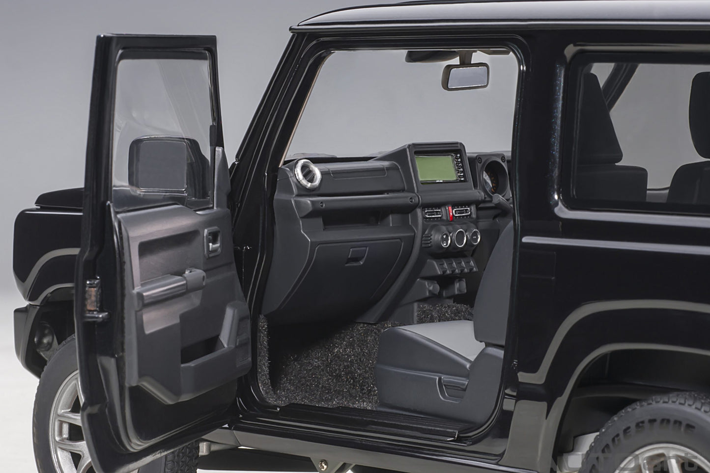 Macheta auto Suzuki Jimny (JB64) (Bluish Black Pearl) 1:18 AutoArt