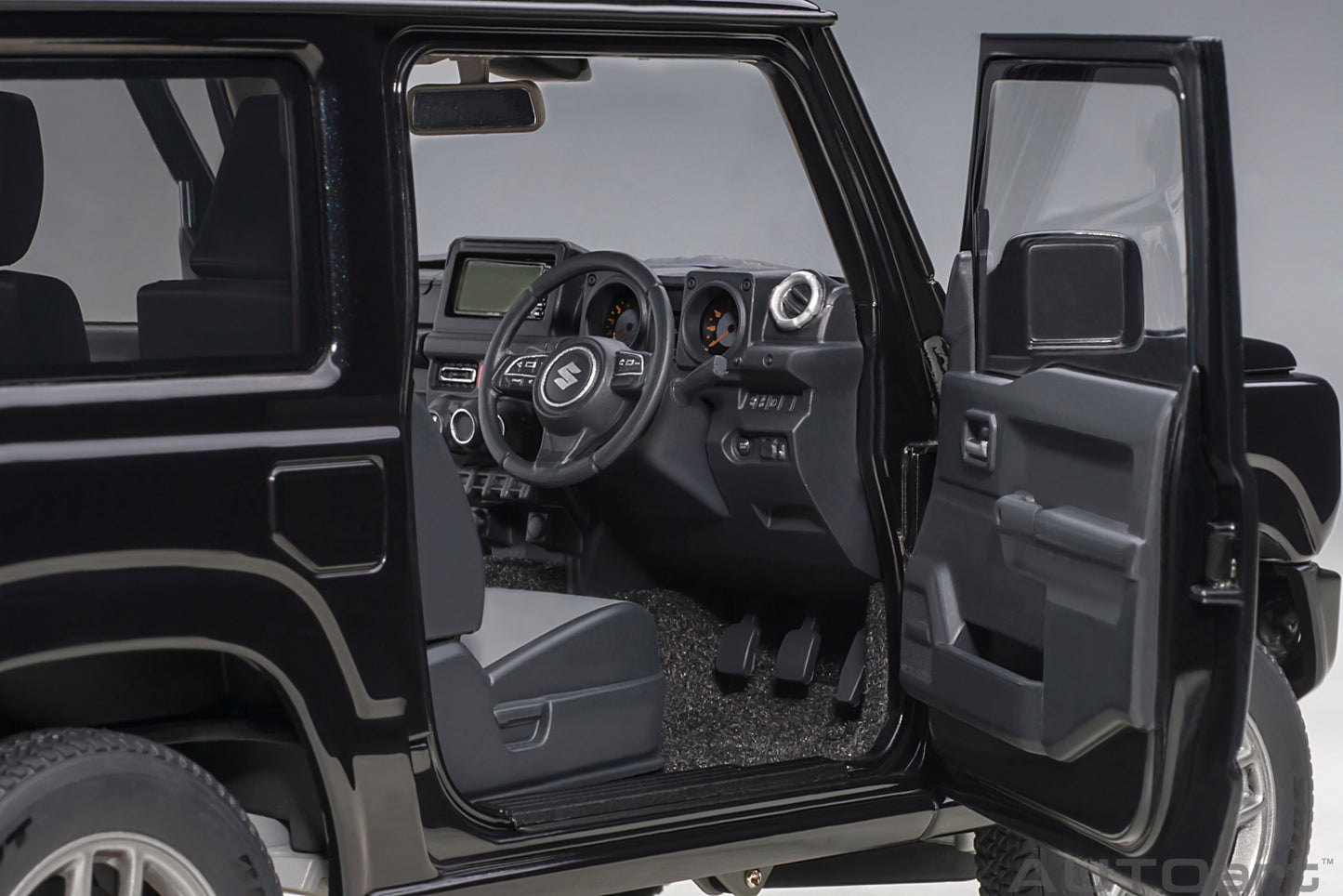 Macheta auto Suzuki Jimny (JB64) (Bluish Black Pearl) 1:18 AutoArt