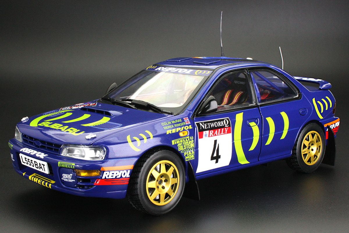 Macheta auto Subaru Impreza 555 – #4 Colin McRae – Derek Ringer – Winner Network Q RAC Rally (1995) 1:18 AutoWorld