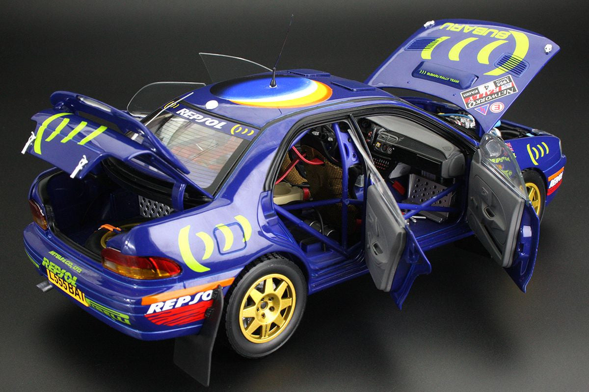 Macheta auto Subaru Impreza 555 – #4 Colin McRae – Derek Ringer – Winner Network Q RAC Rally (1995) 1:18 AutoWorld