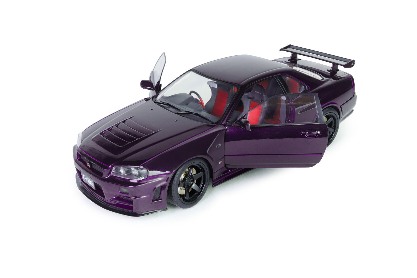 Macheta auto Nissan Skyline GT-R (BNR34) Z-TUNE – midnight purple – 1999 1:18 Solido