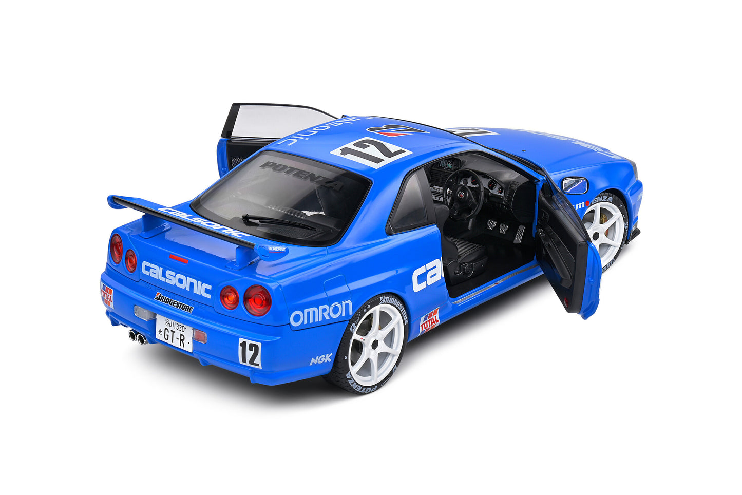 Macheta auto Nissan GT-R (R34) Streetfighter Calsonic Tribute  (2000) 1:18 Solido