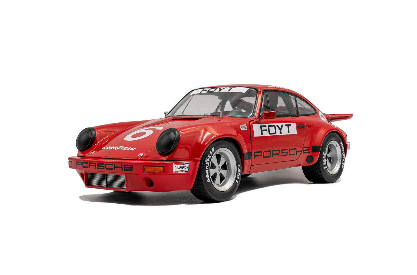 *Precomanda Macheta auto Porsche 911 IROC – IROC Daytona – 1974 – #6 Foyt 1:18 Solido
