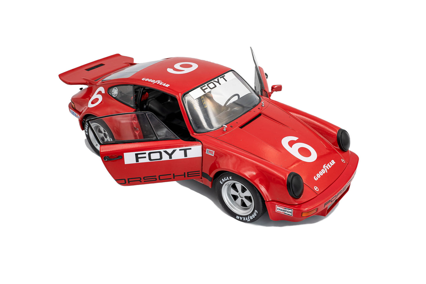 *Precomanda Macheta auto Porsche 911 IROC – IROC Daytona – 1974 – #6 Foyt 1:18 Solido