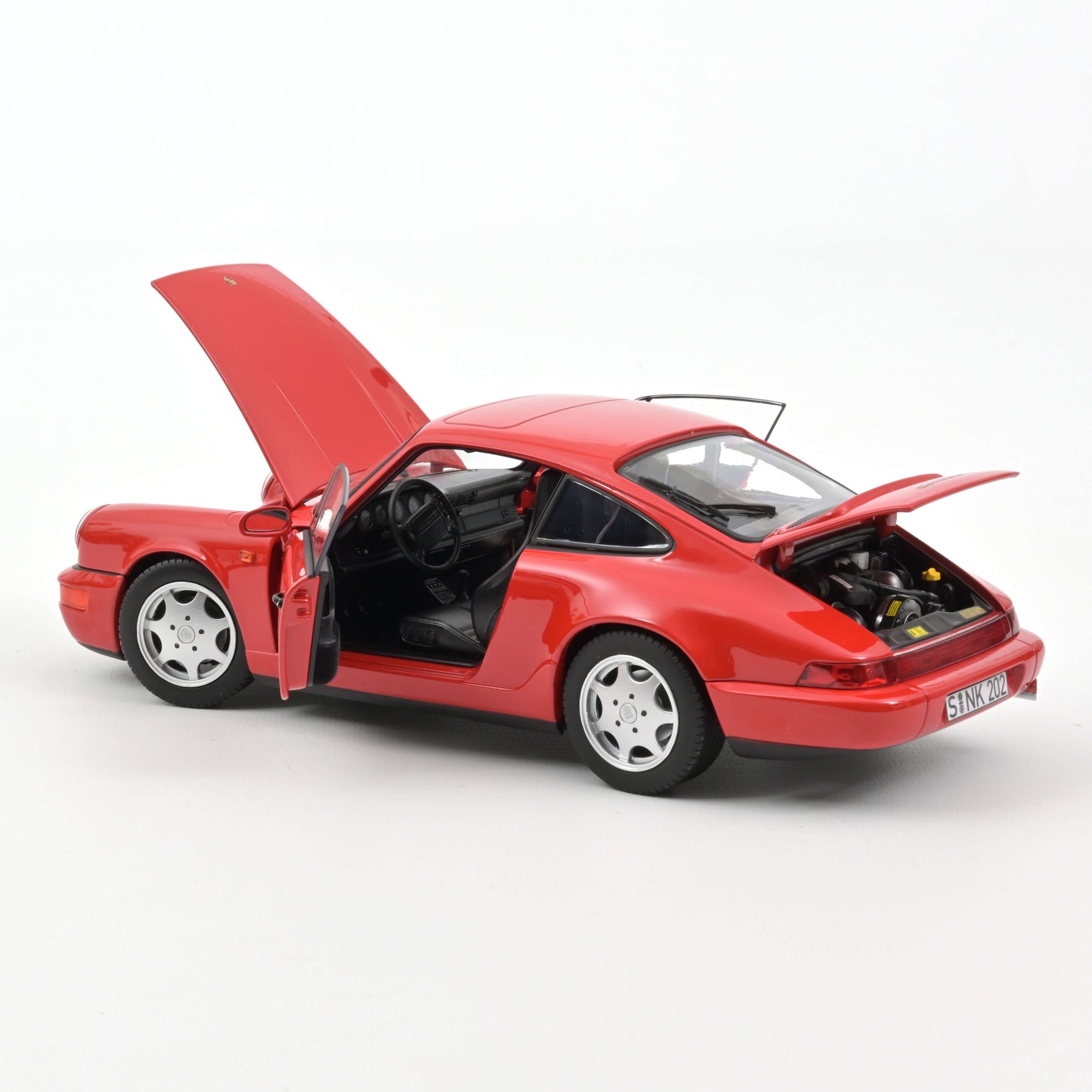 Macheta auto Porsche 911 Carrera 2 (1990) 1:18 Norev